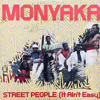 Rectangle Triangle Street People (It Ain't Easy) album cover art featuring urban street scene and stylized typography.