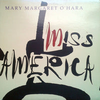 Rectangle Triangle Miss America record album with colorful cover art featuring vibrant, abstract design.