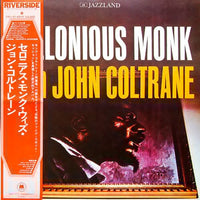 Jazz album cover featuring Thelonious Monk and John Coltrane, with abstract geometric artwork and bold typography.