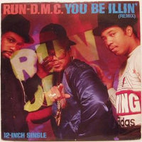 Rectangle Triangle You Be Illin' (Remix) album cover featuring vibrant abstract artwork with bold colors and stylized text.