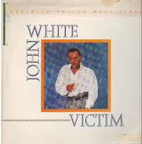 Close-up of the Victim 2 artwork by Rectangle Triangle, featuring abstract shapes and bold colors on a white background.