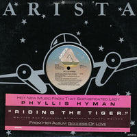 Rectangle Triangle Riding The Tiger album cover featuring bold geometric artwork with vibrant orange and black colors.
