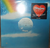 Close-up of the album cover for "The Power Of Love" by Rectangle Triangle, featuring vibrant artwork and bold typography.