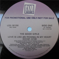 Close-up of the album cover for "Love Is Like An Itching In My Heart" by Rectangle Triangle, featuring abstract artwork and bold text.