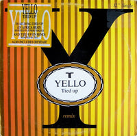 Rectangle Triangle Tied Up (Remix) album cover art featuring abstract geometric shapes and vibrant colors.
