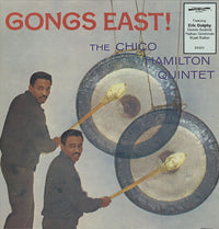 Rectangle Triangle Gongs East! musical gongs with rectangular and triangular shapes, showcasing their textured metallic surfaces.