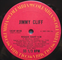 Rectangle Triangle Reggae Night album cover featuring vibrant reggae-inspired artwork with bold colors and musical elements.