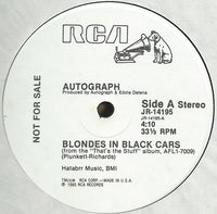 Blondes in black cars scene from Rectangle Triangle, featuring stylish women sitting in sleek black vehicles.