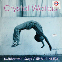 Rectangle Triangle Ghetto Day / What I Need album cover featuring abstract artwork with bold, colorful geometric shapes.