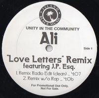 Rectangle Triangle Love Letters (Remix) vinyl record with colorful cover art featuring vibrant geometric shapes and bold typography.