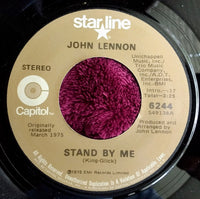 Rectangle Triangle Stand By Me / Woman Is The Nigger Of The World album cover featuring artistic design and bold typography.