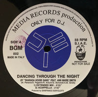 A person dancing through the night wearing stylish clothing, captured in a lively, energetic pose, with vibrant lighting effects.