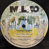 Rectangle Triangle's "Anything You Want 3" vinyl record with colorful abstract album art.