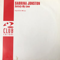 Close-up of Satisfy My Love Superbird Mixes by Rectangle Triangle, showing the vibrant packaging and product details.