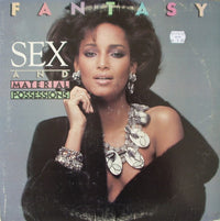 Rectangle Triangle Sex and Material Possessions album cover artwork featuring abstract geometric shapes and bold colors.