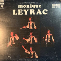 Rectangle Triangle album cover featuring Monique Leyrac's "Les Grands Succès" with vibrant abstract artwork.