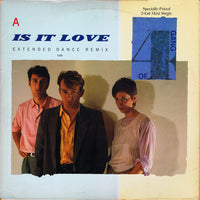 Rectangle Triangle Is It Love extended dance remix album cover featuring vibrant abstract artwork and bold typography.