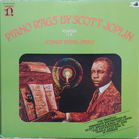 Cover image of "Piano Rags" by Scott Joplin, Volumes I & II, published by Rectangle Triangle, showing sheet music and piano keys.