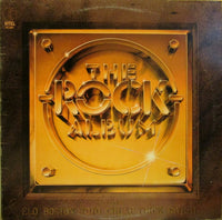 Rectangle Triangle The Rock album cover featuring bold artwork and the band’s name in striking typography.