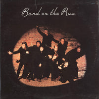 Rectangle Triangle Band On The Run album cover featuring bold graphic design and vibrant colors.