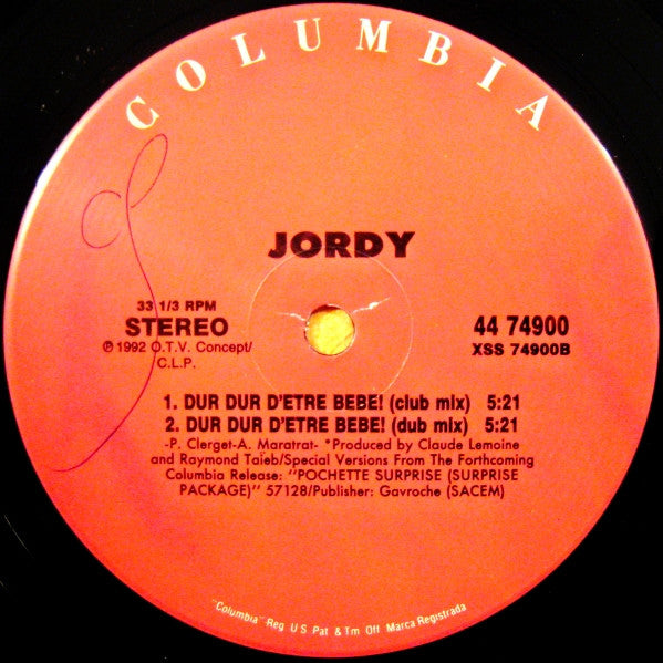 Rectangle Triangle Dur Dur D'Être Bébé! colorful plush toy with geometric shapes for infant play and development.
