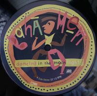 Rectangle Triangle Dancing In The Moonlight album cover featuring moonlit night scene with artistic design elements.