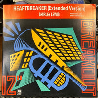 Rectangle Triangle Heartbreaker (Extended Version) album cover art featuring abstract geometric shapes and bold typography.