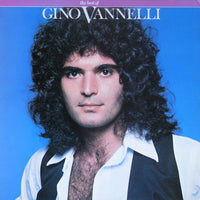 Rectangle Triangle album cover for Gino Vannelli's The Best Of featuring vibrant abstract artwork and bold typography.