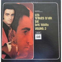 Cover image of "Les Titres D'or de Dick Rivers Volume 2" album by Rectangle Triangle, featuring classic music artwork.