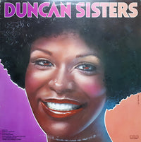 Close-up of The Duncan Sisters artwork by Rectangle Triangle, showcasing vibrant colors and detailed illustrations.