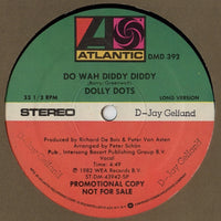 Rectangle Triangle Do Wah Diddy Diddy vinyl record with colorful abstract cover art, showcasing bold geometric shapes and vibrant colors.