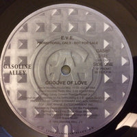 Rectangle Triangle Groove Of Love remix record featuring vibrant album artwork and a black vinyl record.