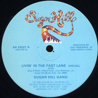 Rectangle Triangle Livin' In The Fast Lane album cover featuring bold graphic design and vibrant colors.