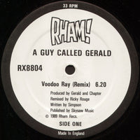 Rectangle Triangle Voodoo Ray (Remix) vinyl record with colorful abstract cover art and turntable in the background.