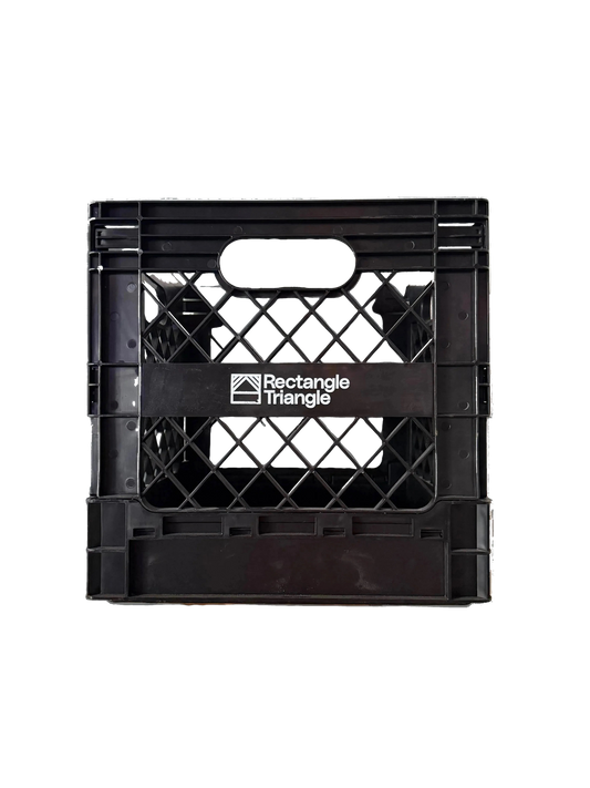 Rectangular Triangle RT Milk Crate for storage, showing sturdy plastic construction with open slats for ventilation and organization.
