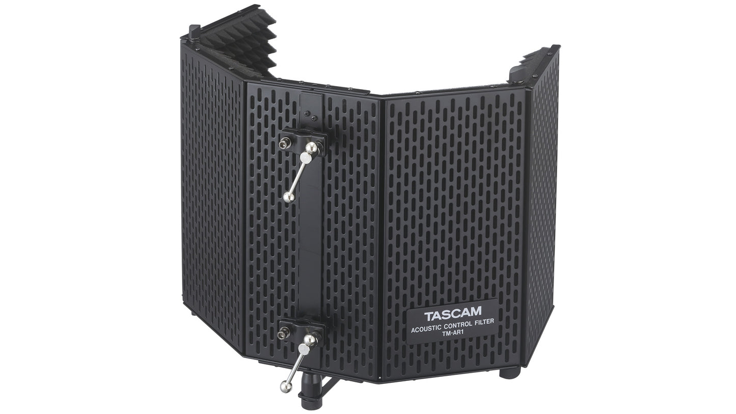 Tascam TM-AR1 microphone reflection and control filter attached to a microphone for recording sound isolation.