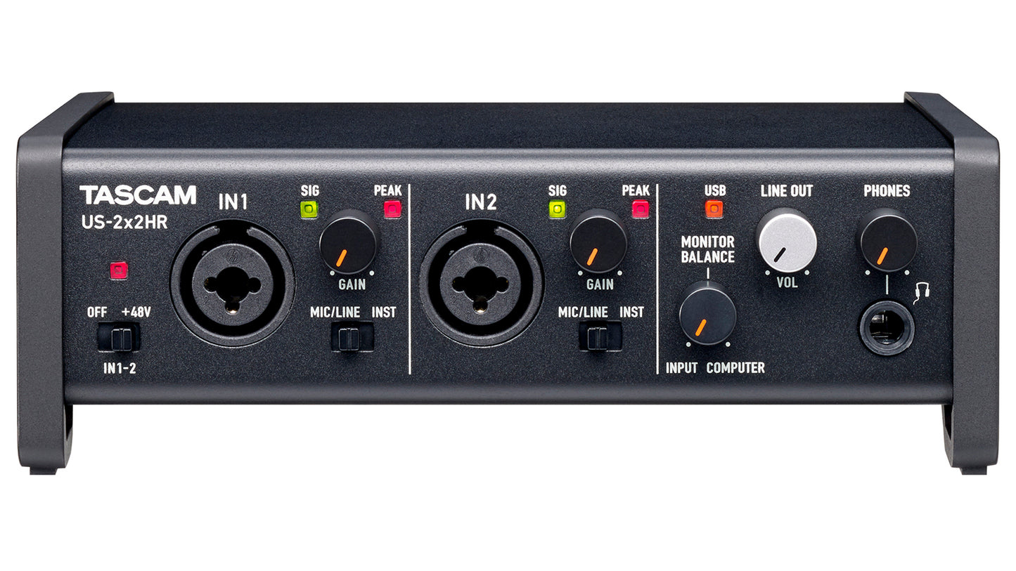 Tascam 2-in 2-out USB-C audio interface with front input and output ports for computer audio recording and streaming.